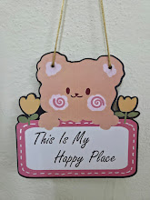 Decorative sign reading This Is My Happy Place